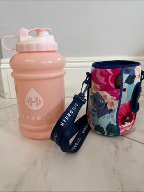 HydroJug with navy pink floral neoprene sleeve with strap and pocket 2.2 liters